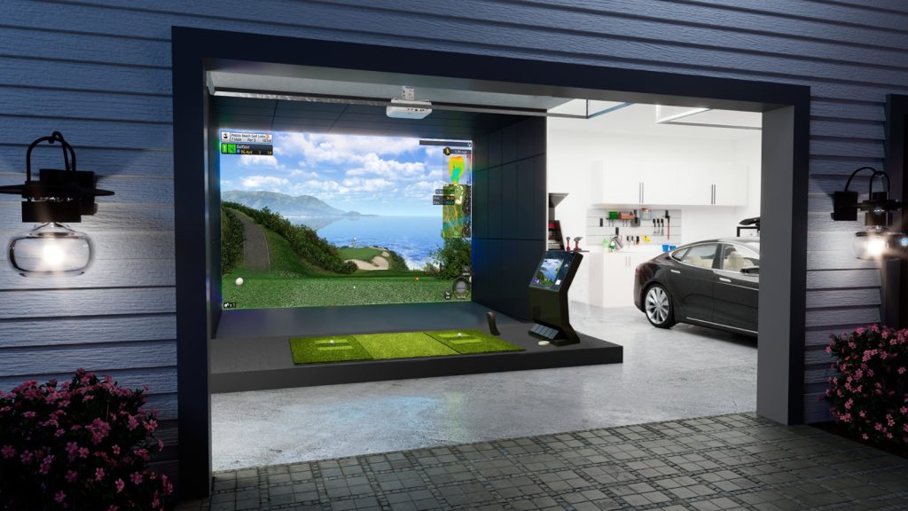 Residential garage golf simulator designed for year-round indoor golf practice.