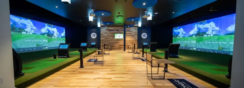 Indoor golf simulator facility demonstrating how golf simulators work with real-time swing analysis and virtual golf.